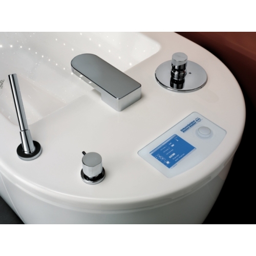 Zbliżenie na elementy sterujące i dysze wanny Caracalla – system hydromasażu wodno-powietrznego.